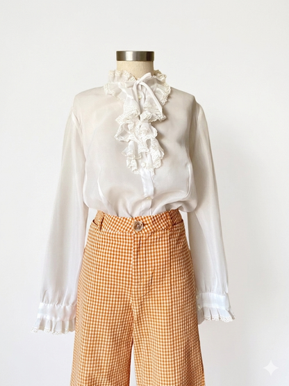 White ruffle blouse